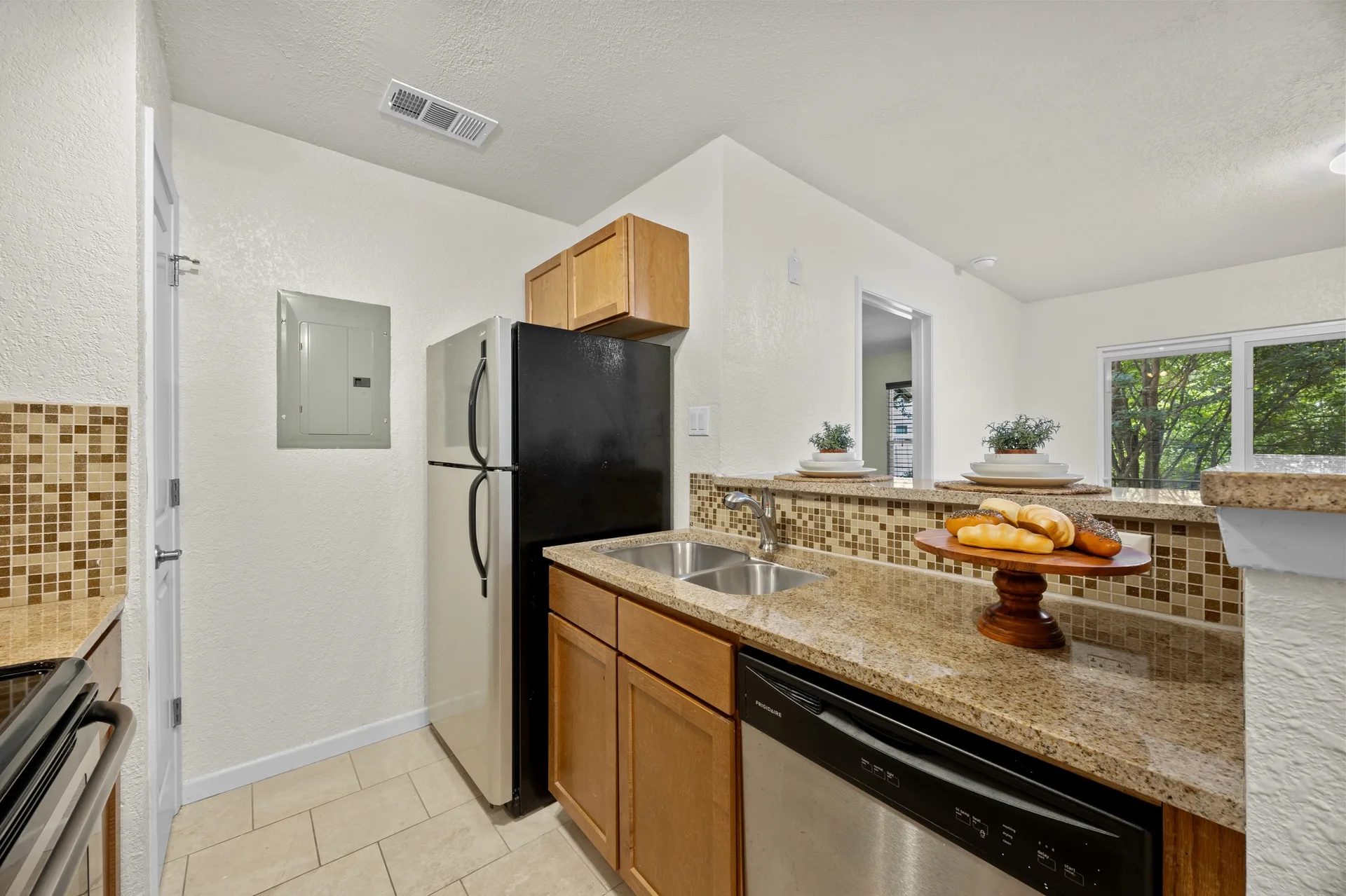 Top-Floor Condo Retreat in Gated Ivy Condos | Private Balcony + Tree-Filled Views photo 18
