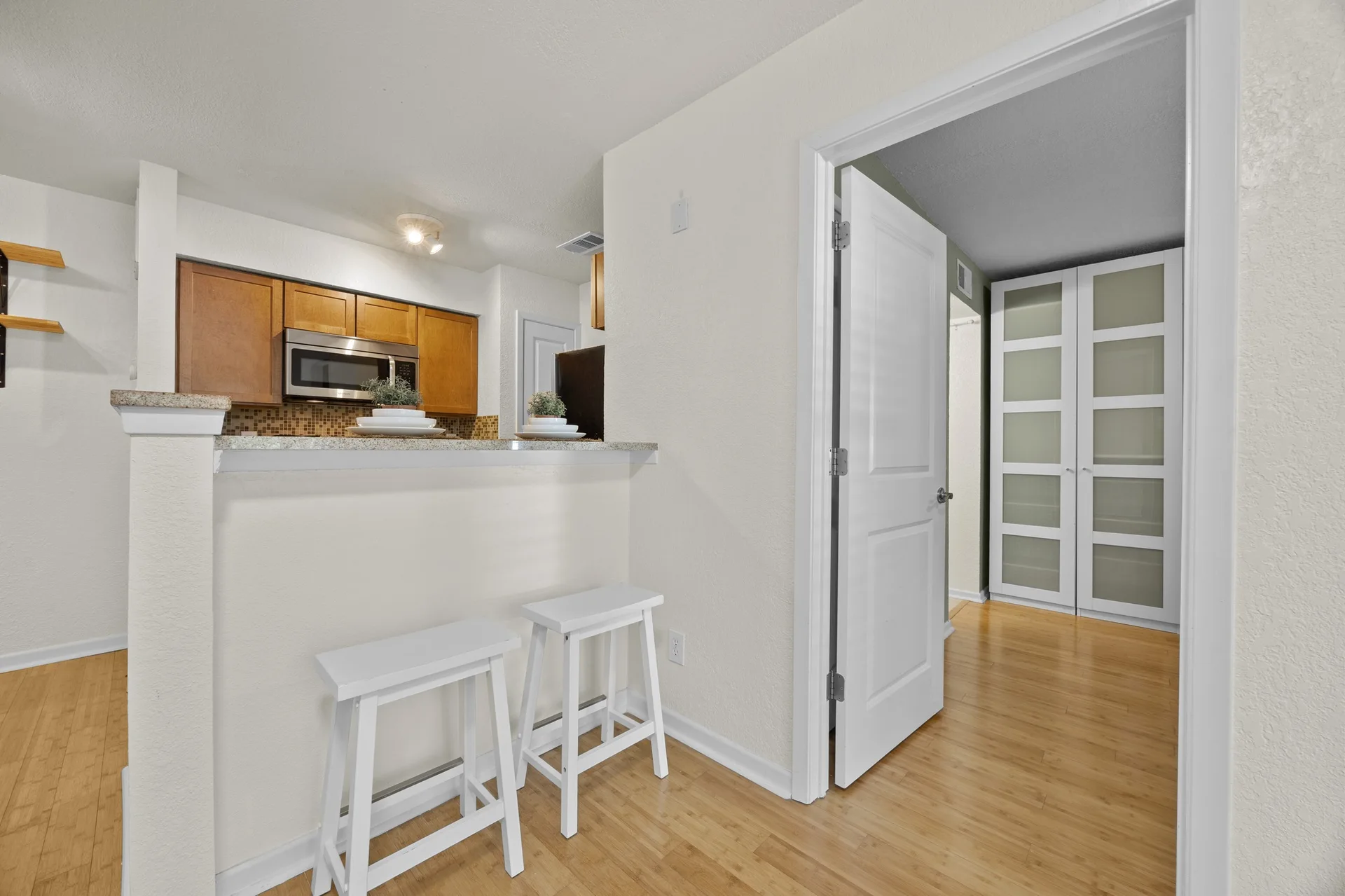 Top-Floor Condo Retreat in Gated Ivy Condos | Private Balcony + Tree-Filled Views photo 10
