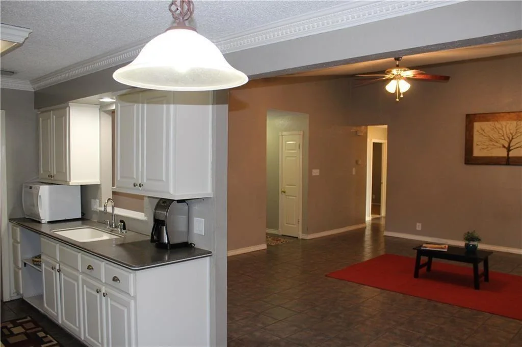 Vaulted Ceilings, Cozy Fireplace & No Carpet | Charming Round Rock 1-Story photo 6