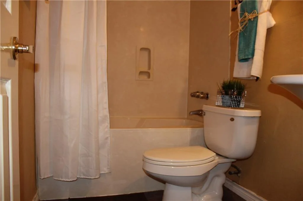 Vaulted Ceilings, Cozy Fireplace & No Carpet | Charming Round Rock 1-Story photo 14