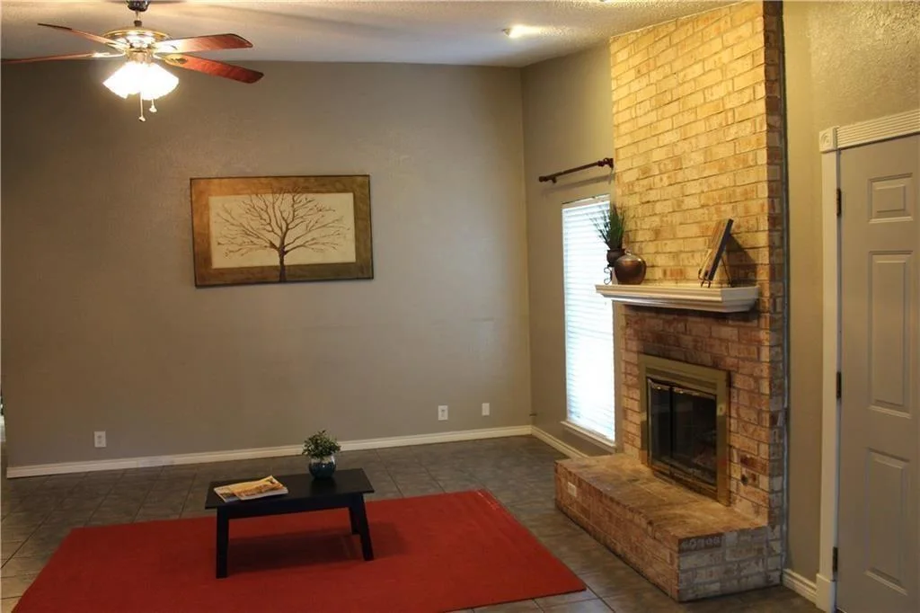 Vaulted Ceilings, Cozy Fireplace & No Carpet | Charming Round Rock 1-Story photo 5