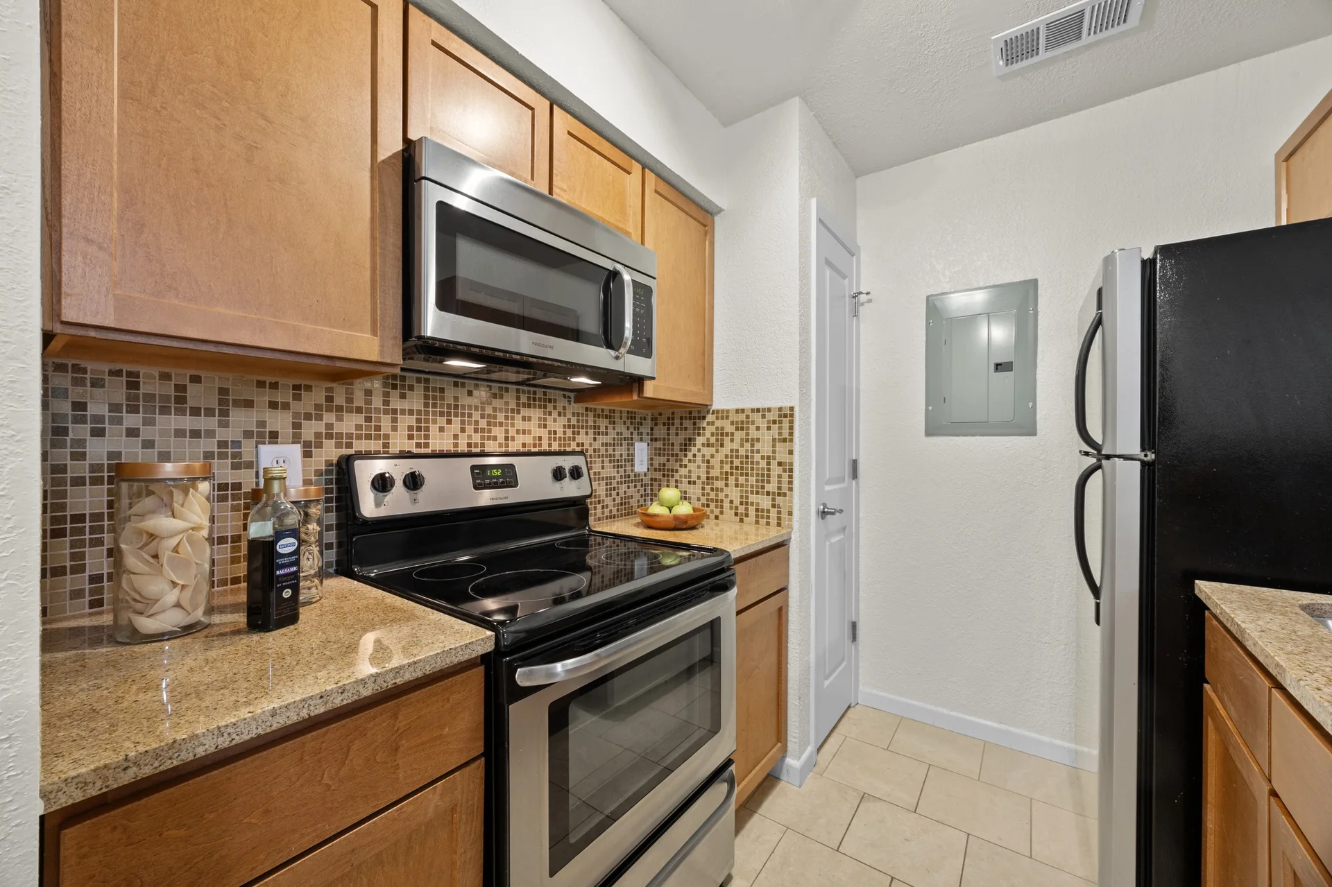 Top-Floor Condo Retreat in Gated Ivy Condos | Private Balcony + Tree-Filled Views photo 15