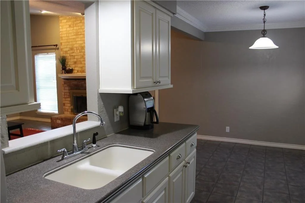 Vaulted Ceilings, Cozy Fireplace & No Carpet | Charming Round Rock 1-Story photo 9