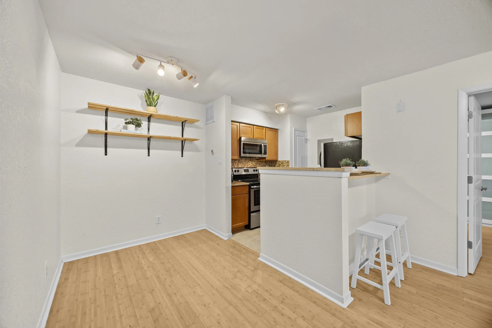 Top-Floor Condo Retreat in Gated Ivy Condos | Private Balcony + Tree-Filled Views photo 7