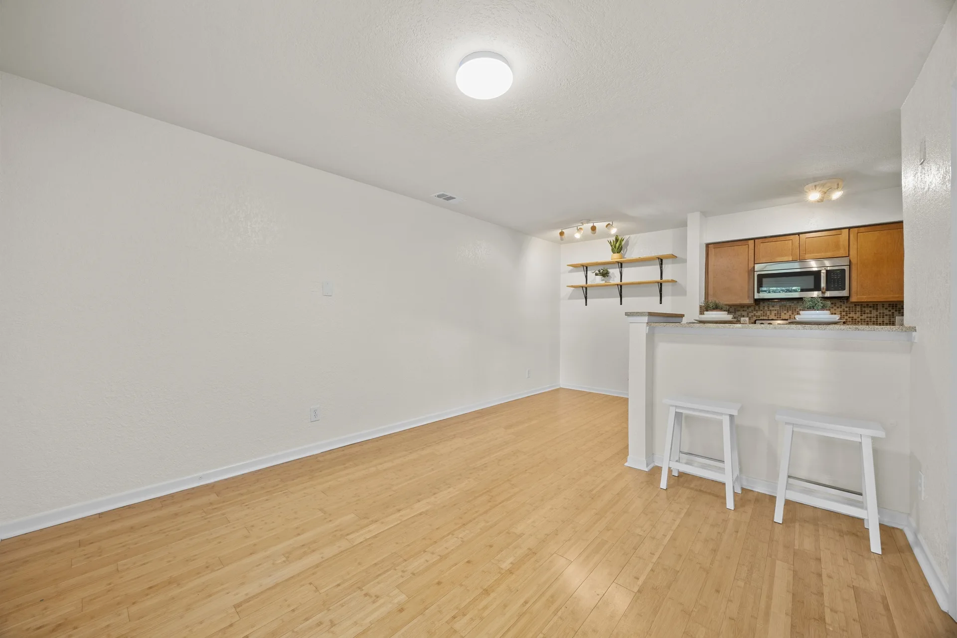 Top-Floor Condo Retreat in Gated Ivy Condos | Private Balcony + Tree-Filled Views photo 9