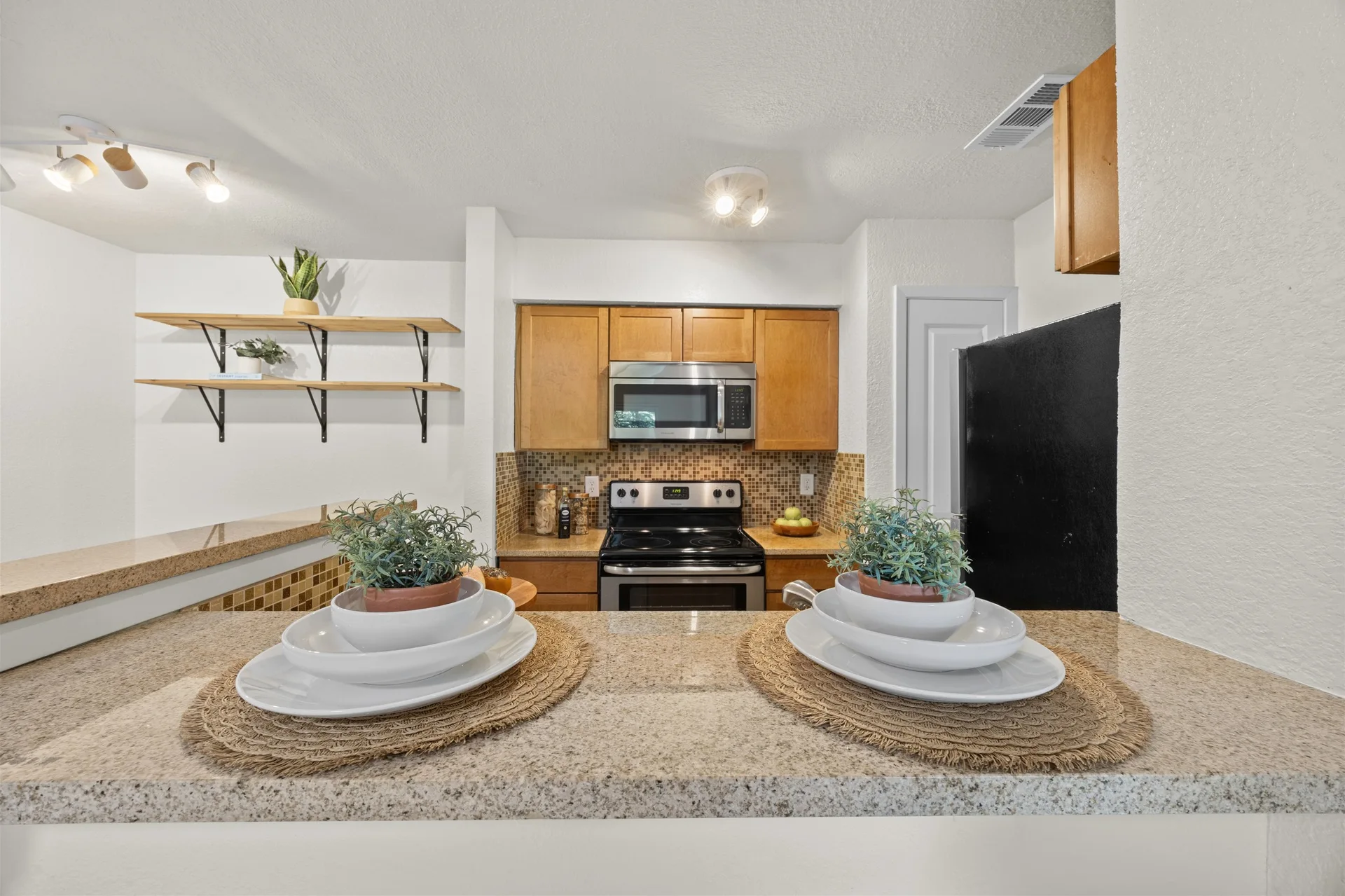 Top-Floor Condo Retreat in Gated Ivy Condos | Private Balcony + Tree-Filled Views photo 12