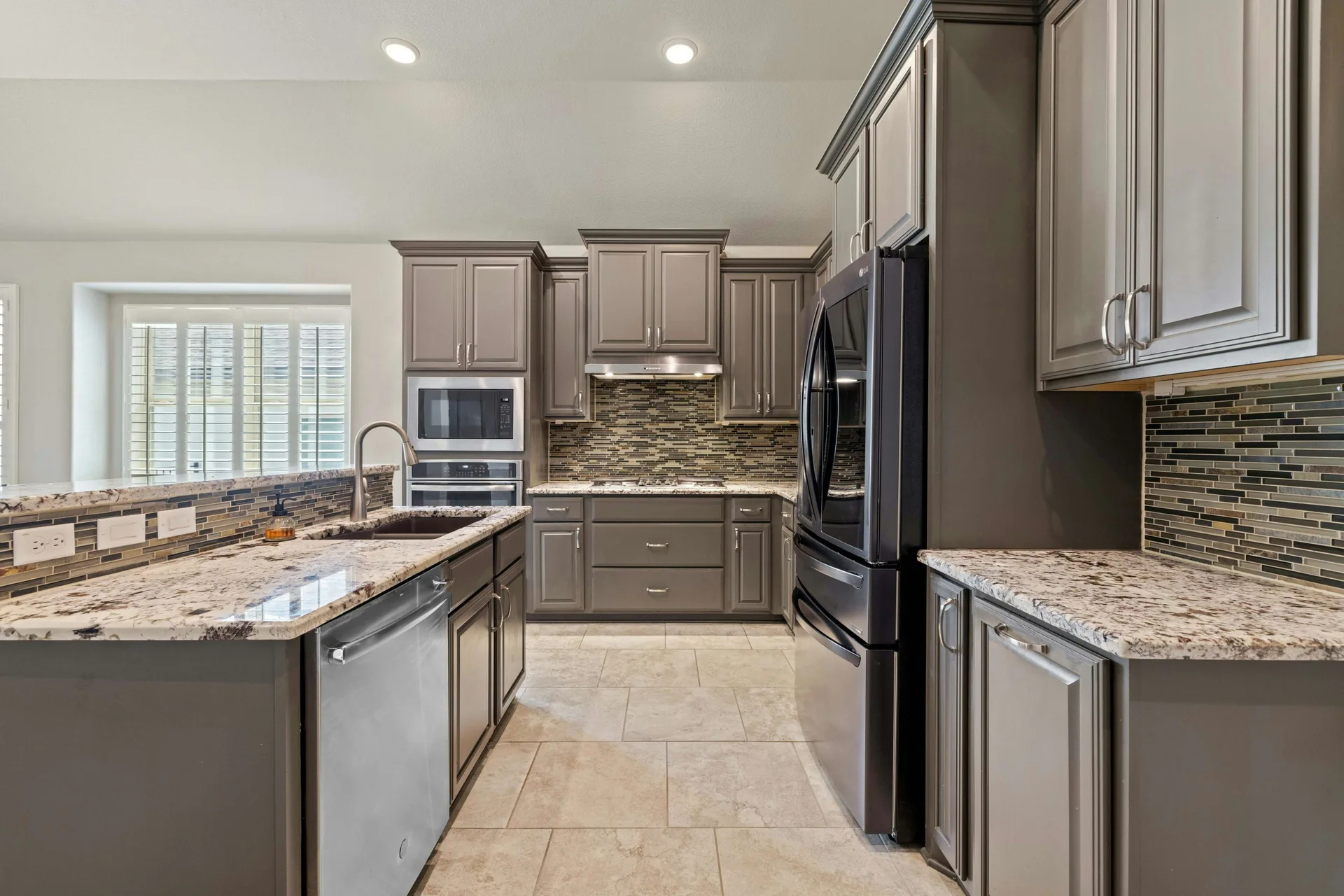 Impeccably Maintained 1-Story Taylor Morrison Home with Luxurious Amenities in Desirable Travisso Neighborhood! photo 11